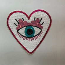  The eye that sees all sequence applique.