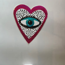  The Eye that sees all sequence applique