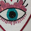 The eye that sees all sequence applique.